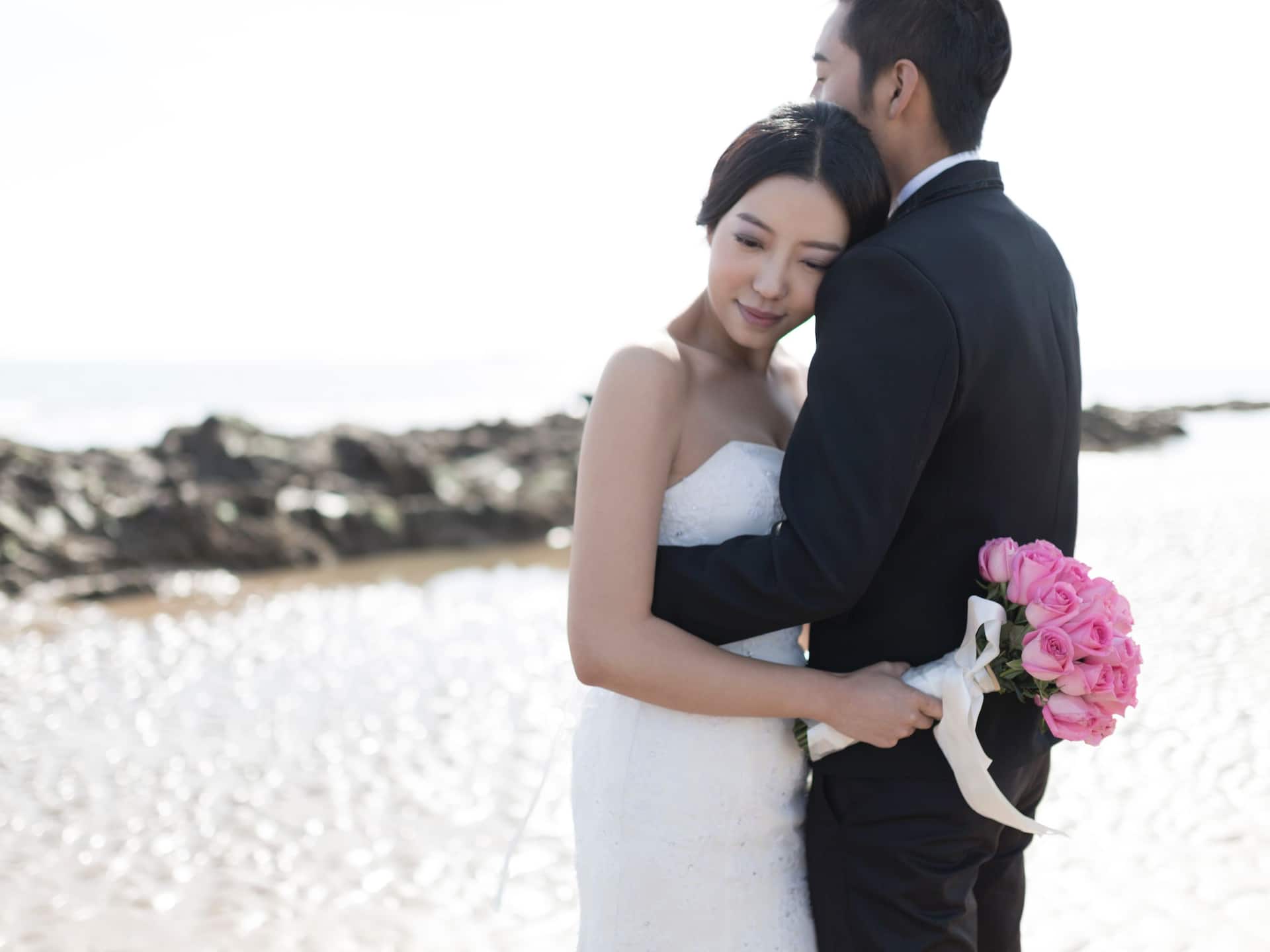 Hyatt Regency Qingdao Wedding Couple by the Ocean