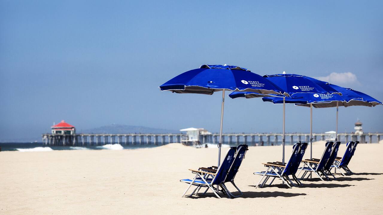 Beachside chairs and umbrellas on the beach near