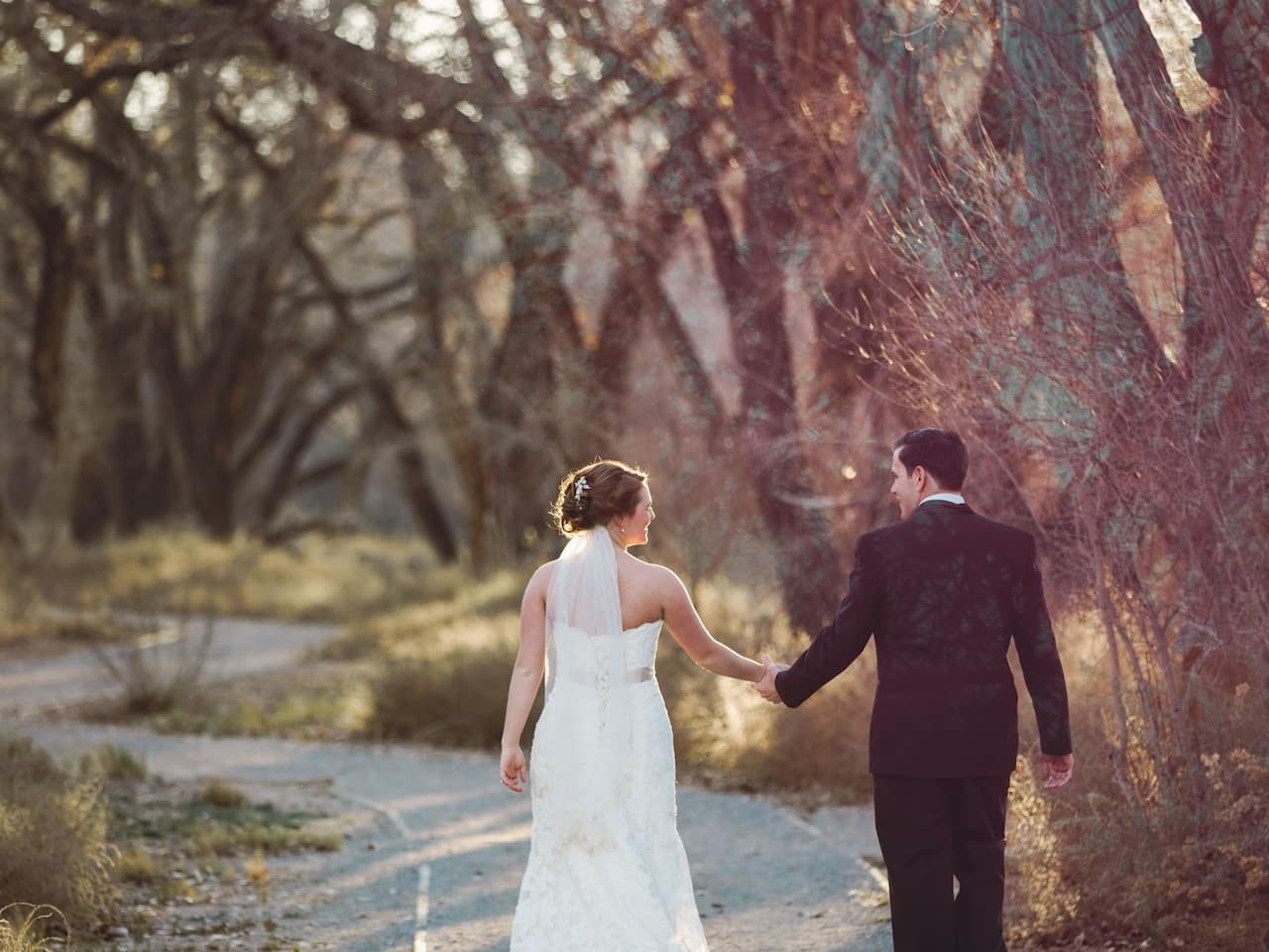 Wedding Bride and Groom walking Hyatt Regency Tamaya Resort & Spa