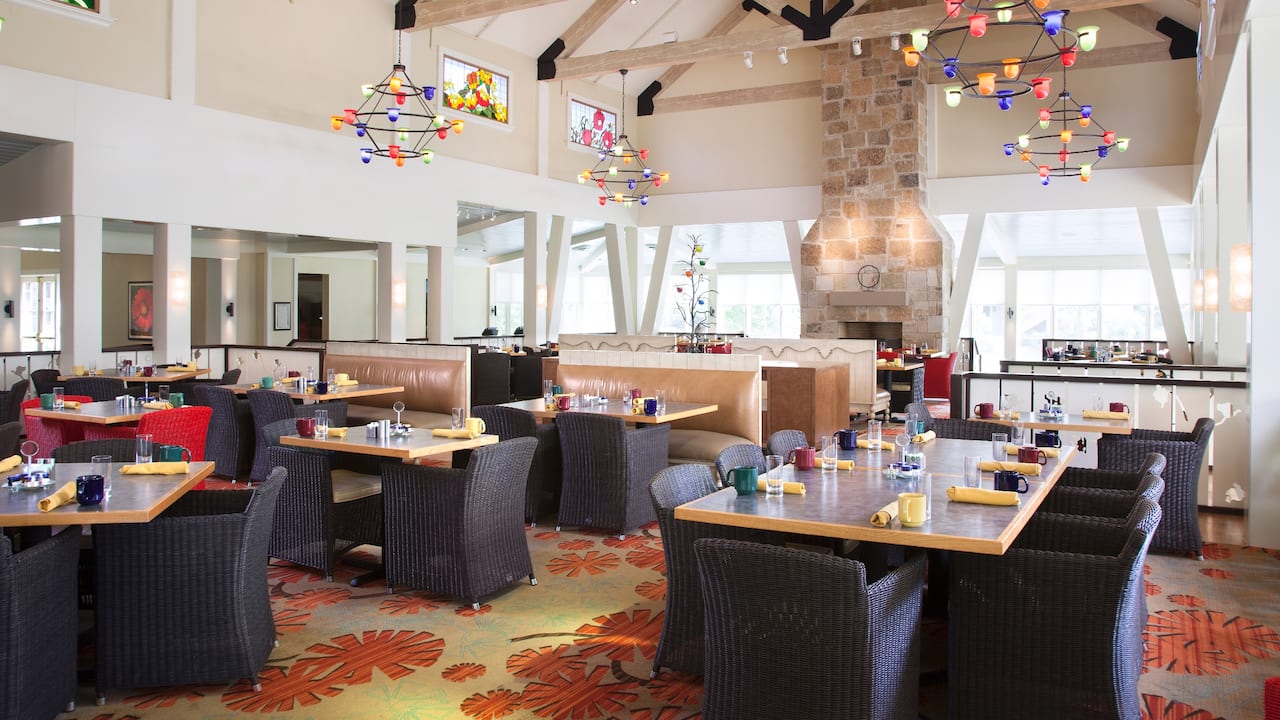 Firewheel Cafe dining area with fireplace and chandeliers