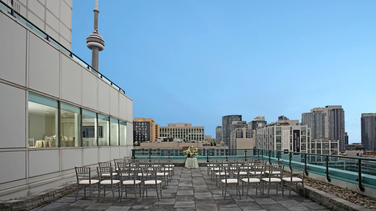 Outdoor Rooftop wedding ceremony with CN Tower in the background