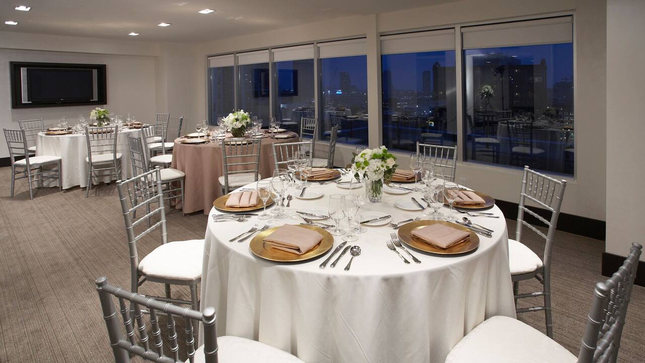 Wedding reception with nighttime city views