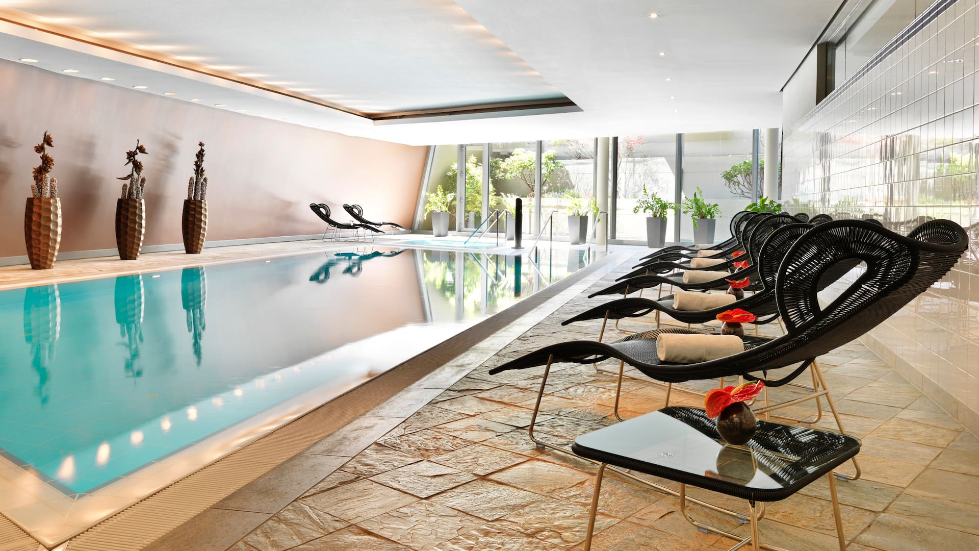 Pool with loungers for relaxing at Club Olympus Spa and Fitness at Hyatt Regency Mainz