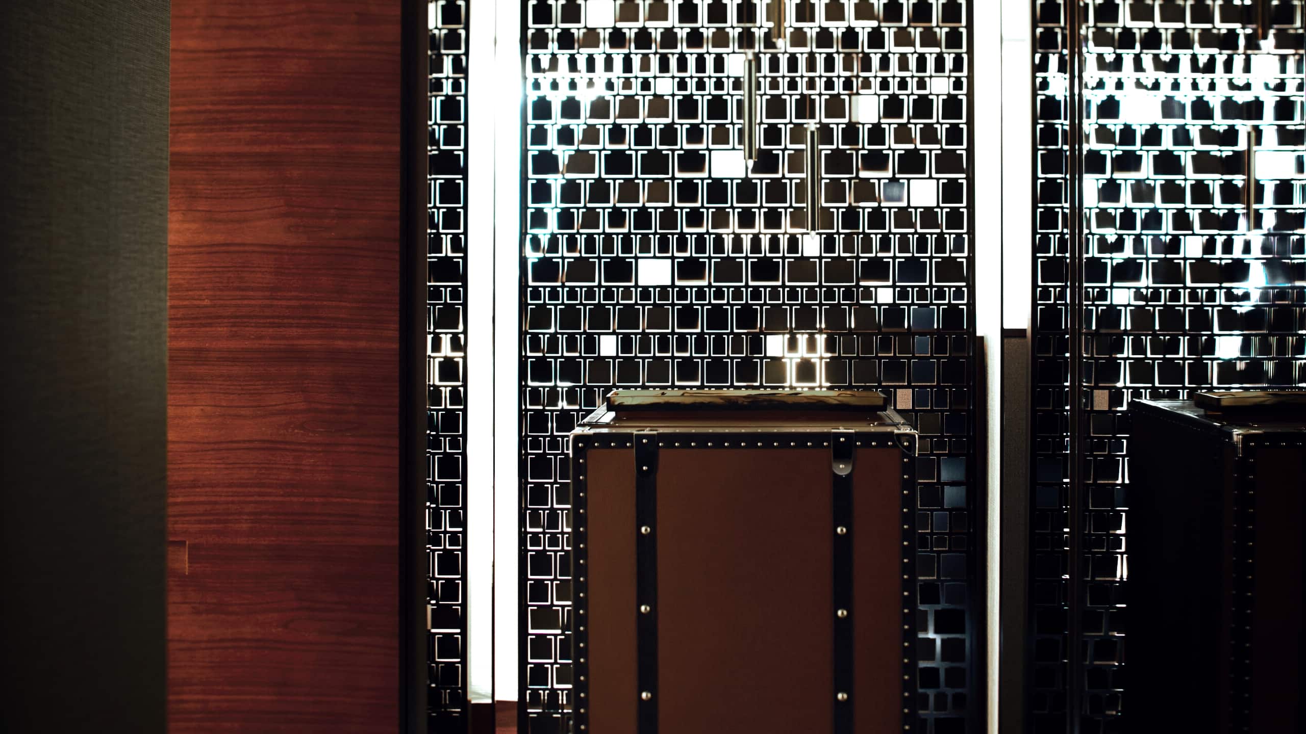 5 of 5 Entrance to a room with luggage in the foreground