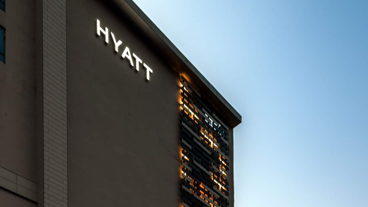Hyatt Raipur     Sophisticated rooms & suites: 105 contemporary guestrooms including four luxury hotel suites measuring 27 sq m to 84 sq m, each with a work station and high-speed complimentary Internet connectivity   Central Location : Hyatt Raipur is a premium business hotel with close proximity to Raipur’s Swami Vivekananda Airport, just a mere 15 minutes away by car   Delectable Dining: Café Oriza, our all-day dining café or enjoy the comforts of a lounge-bar at The Bar. StayFit at Hyatt offers state-of-the-art fitness equipment.   Memorable meetings and events: 10,000 sq ft of meeting and event space with a Ballroom measuring 4,740 sq ft which opens into a 5,500 plus sq ft terrace, Hyatt Raipur is the perfect choice to host conventions, business events and weddings.     Entertainment: Hyatt Raipur is part of a mixed-use complex, Magneto The Mall.  The mall houses a four-screen state-of-the-art multiplex cinema, lifestyle stores and a commercial office hub.