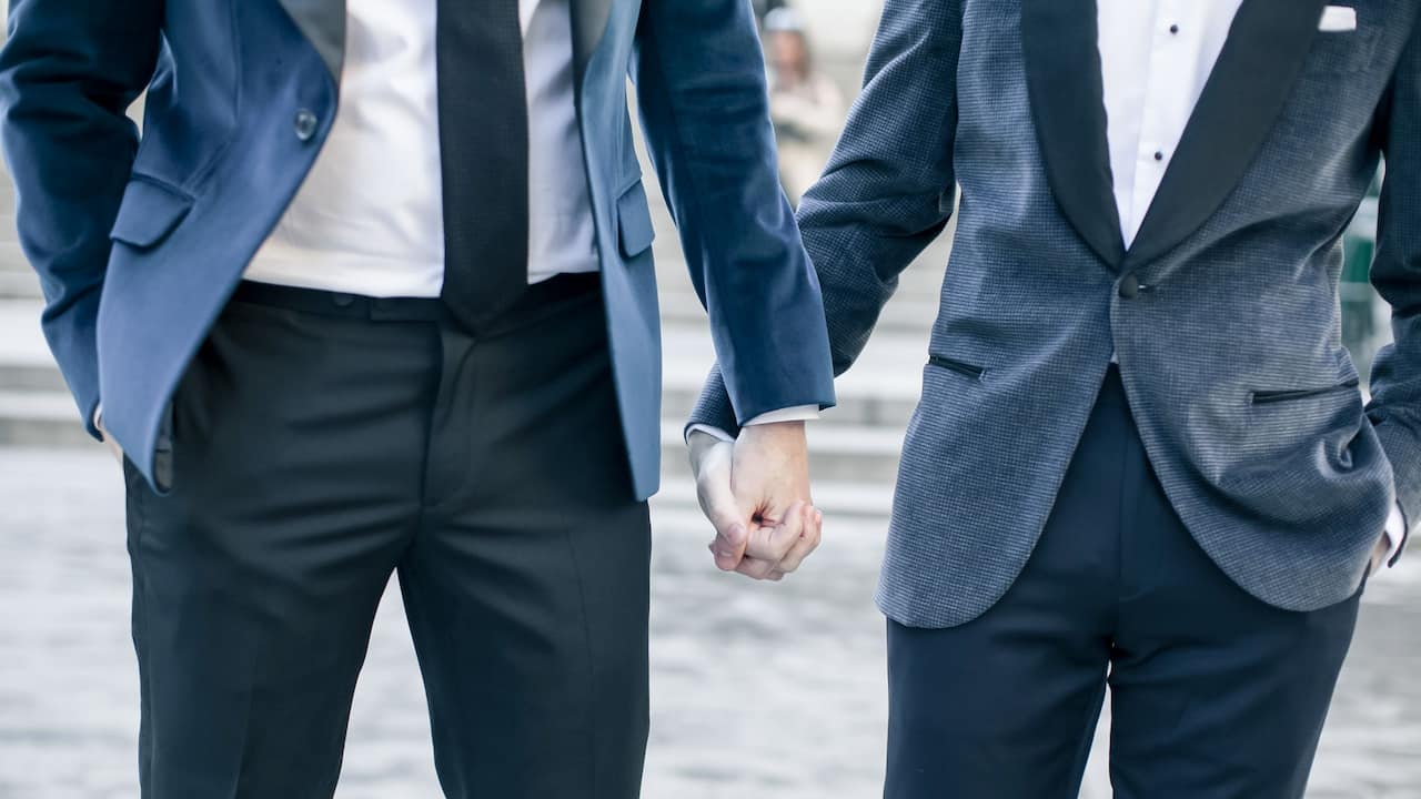 Couple holding hands at a small wedding venue in NYC