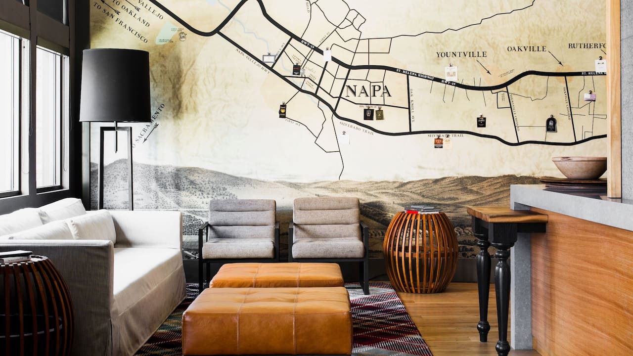 Lobby lounge seating area with map of downtown Napa