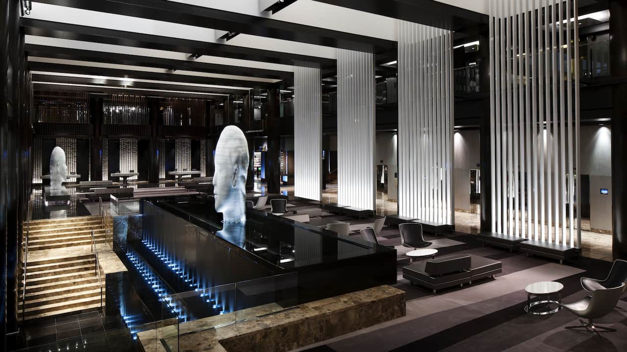Lobby with seating area featuring a unique 3D water sculpture at Hyatt Grand Central New York