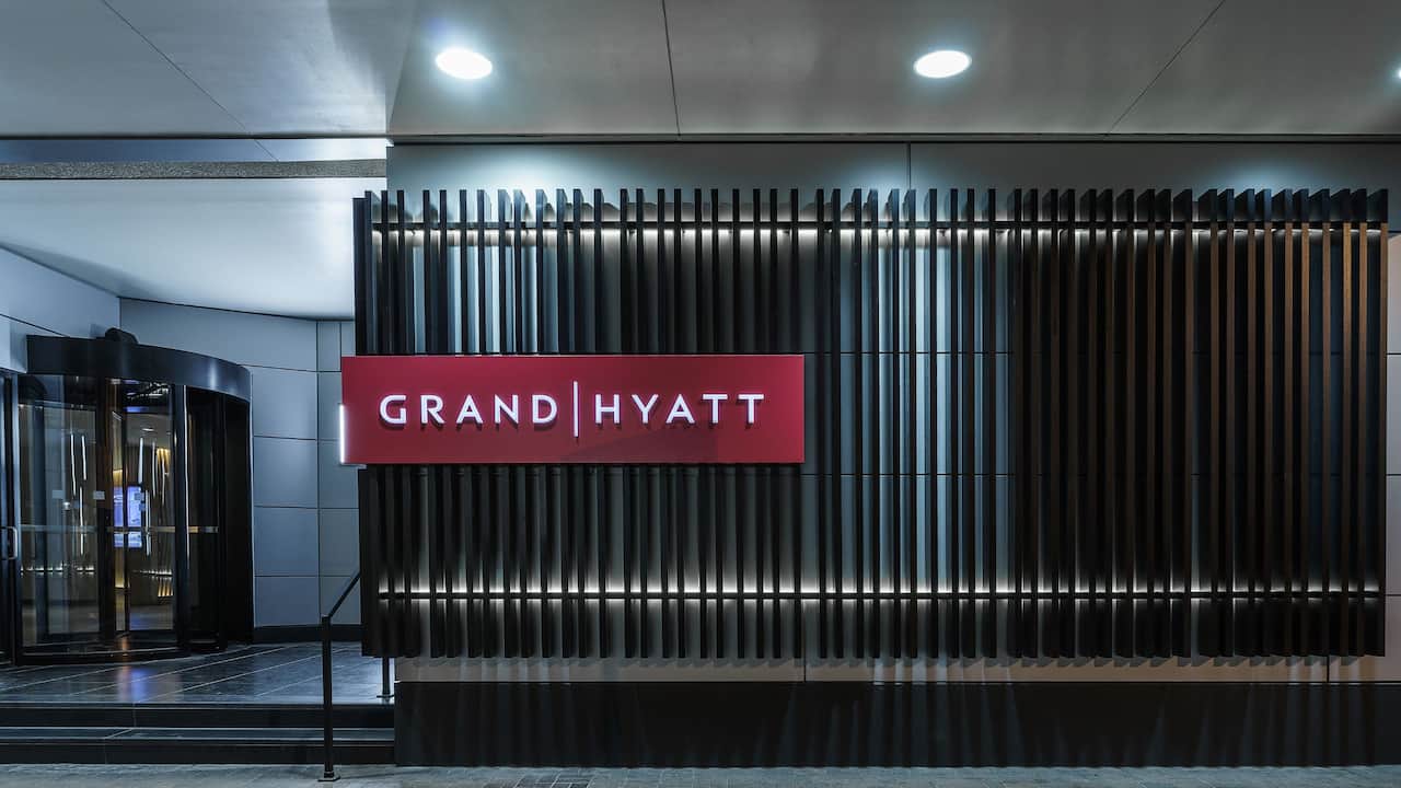 Hotel Entrance with sign that says Grand Hyatt