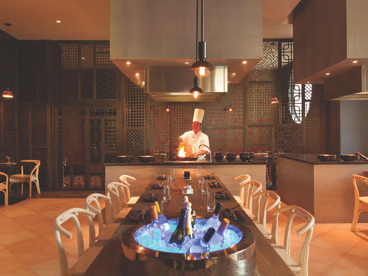 Chef cooking in open kitchen