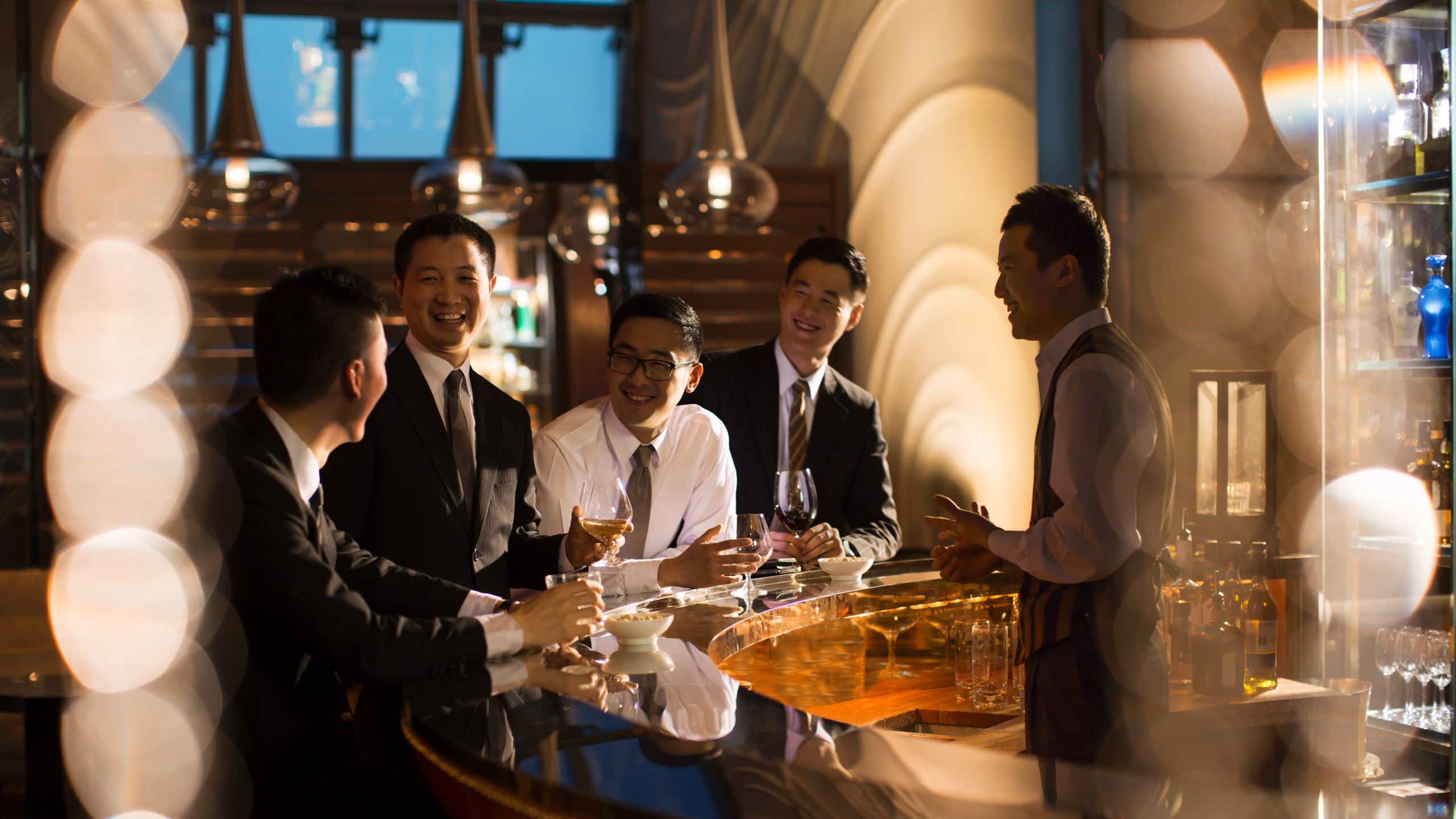 Global Businessmen at Bar