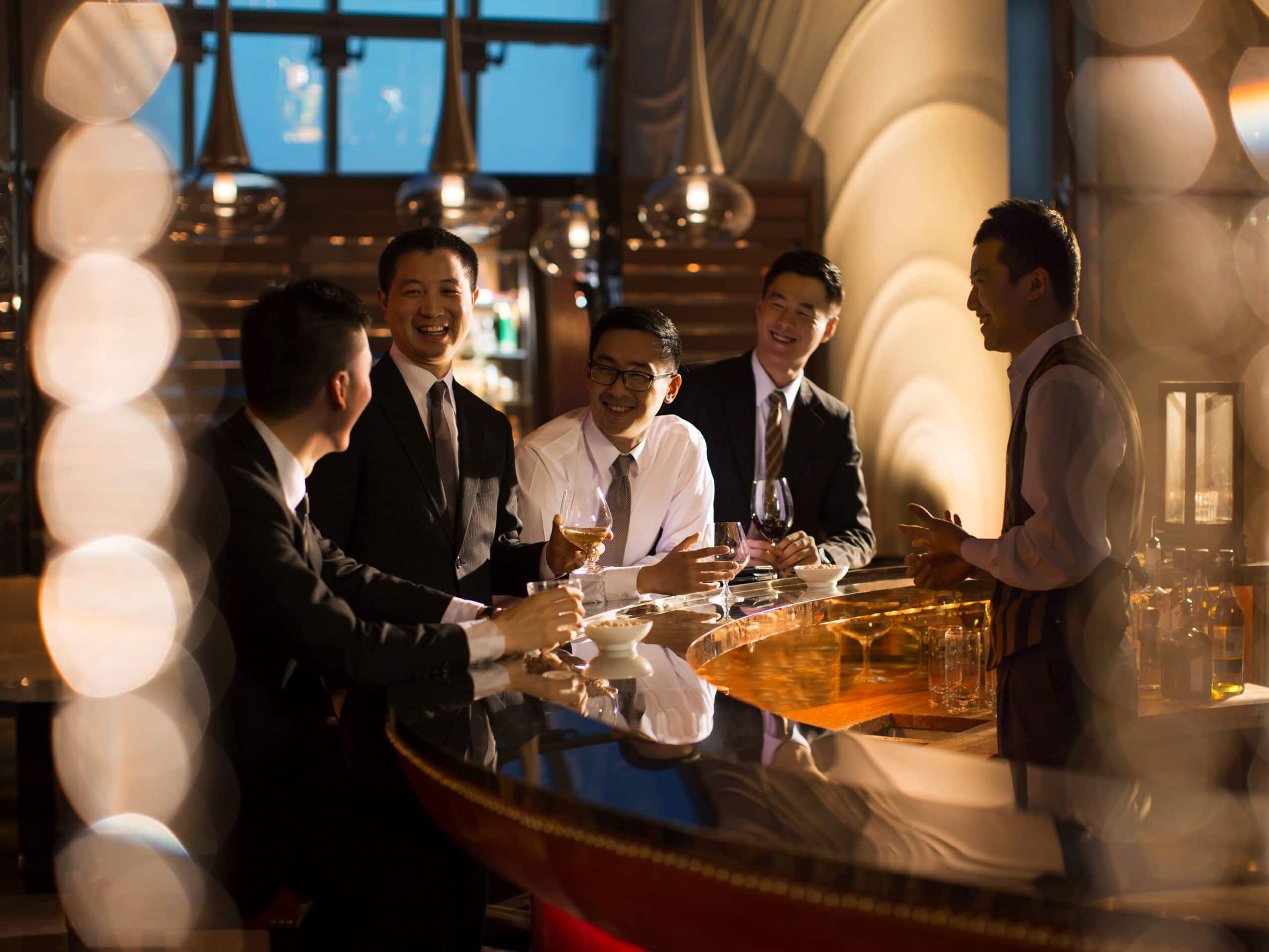 Global Businessmen at Bar