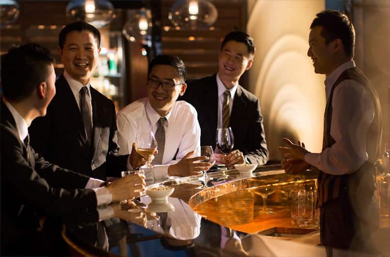 Global Businessmen at Bar