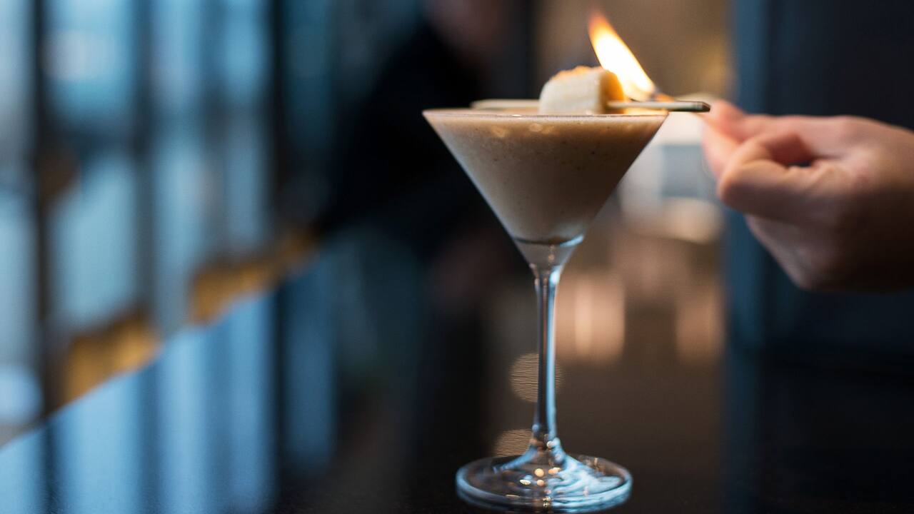 Cocktail in glass on table
