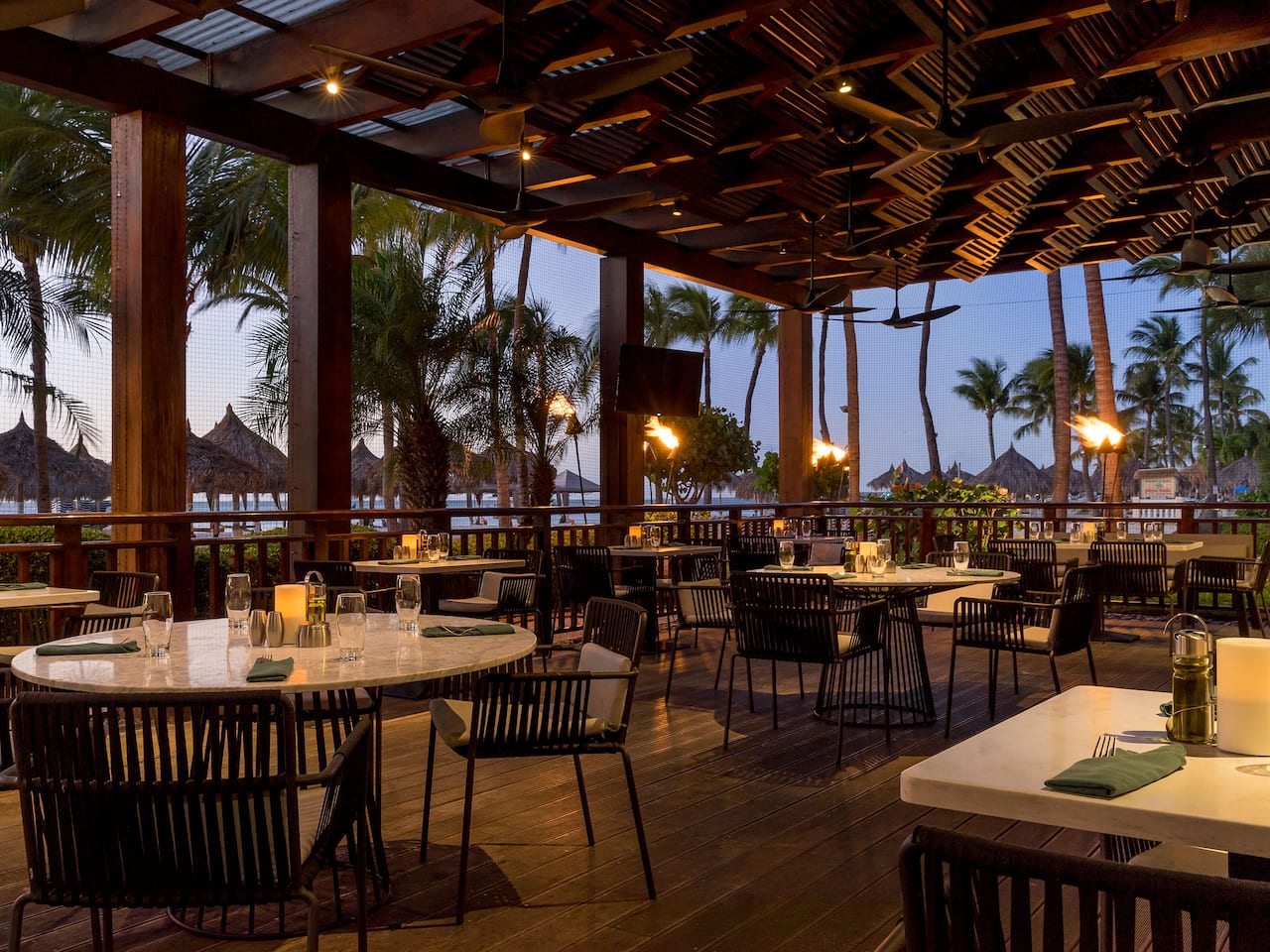 Covered dining area at beachfront restaurant in Aruba