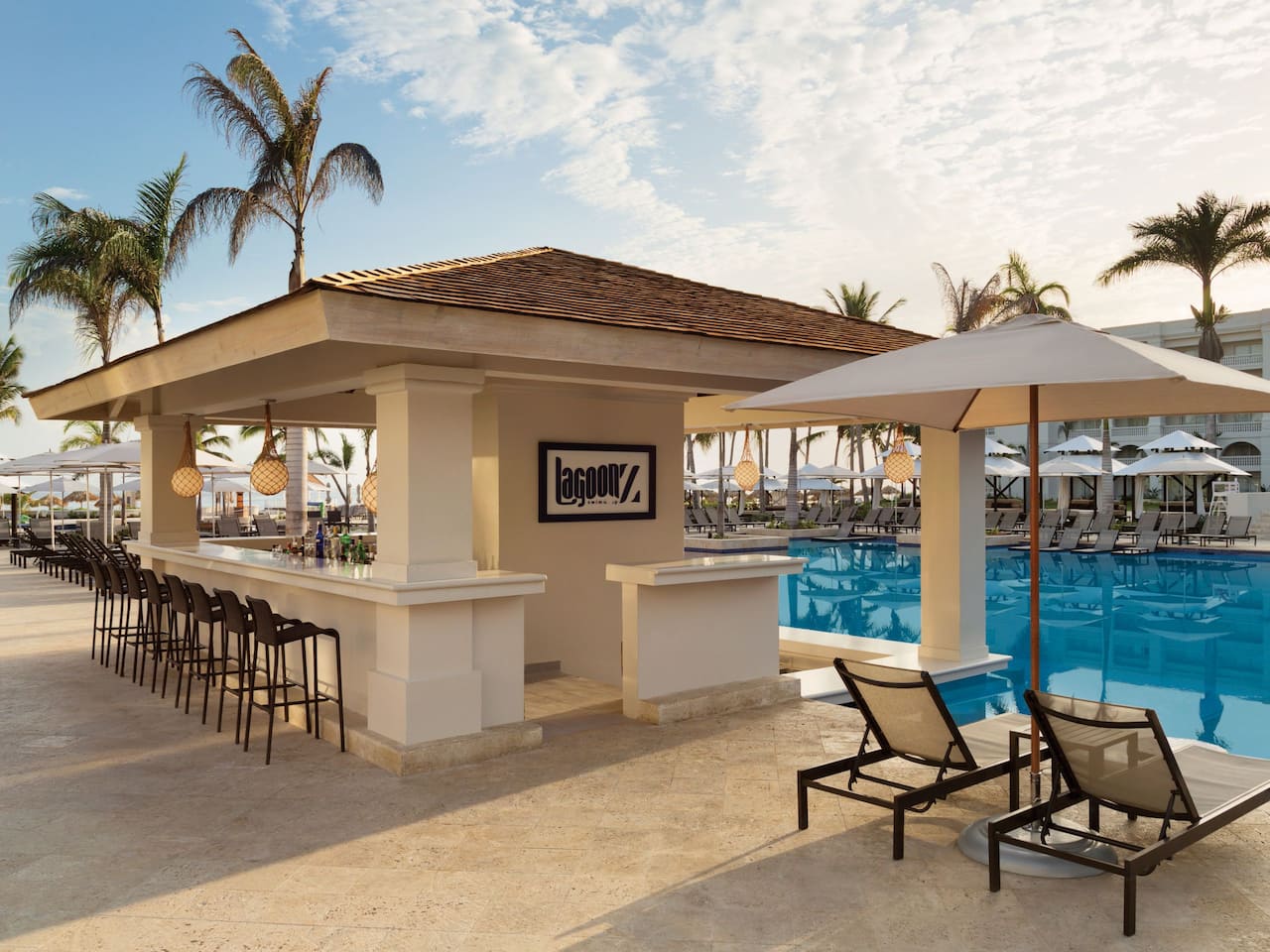 Bar, pool and lounge chairs at LagoonZ Swim-Up Bar at Hyatt Ziva Rose Hall