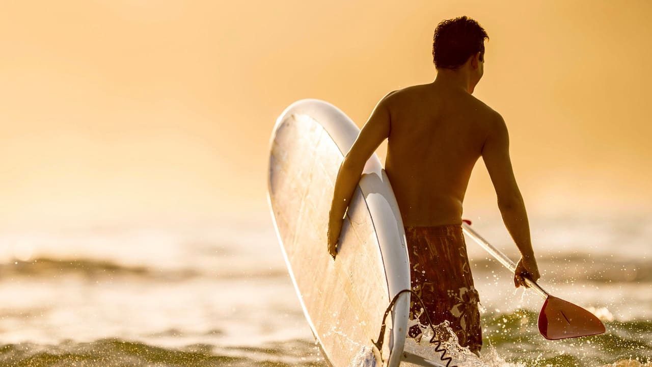 Surfing at Waikiki Beach