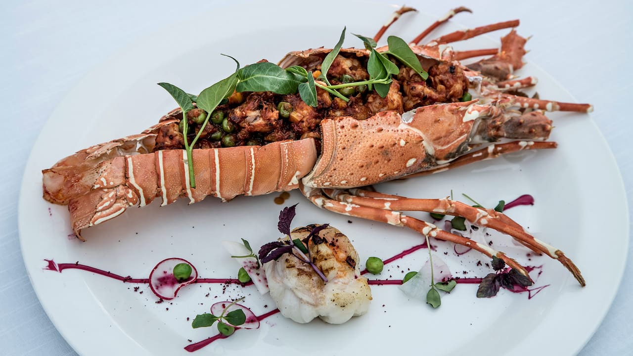 Luxury Maldives resort seafood restaurant all inclusive package grilled prawn