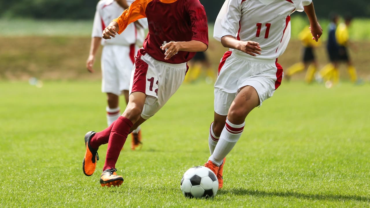 Men playing football
