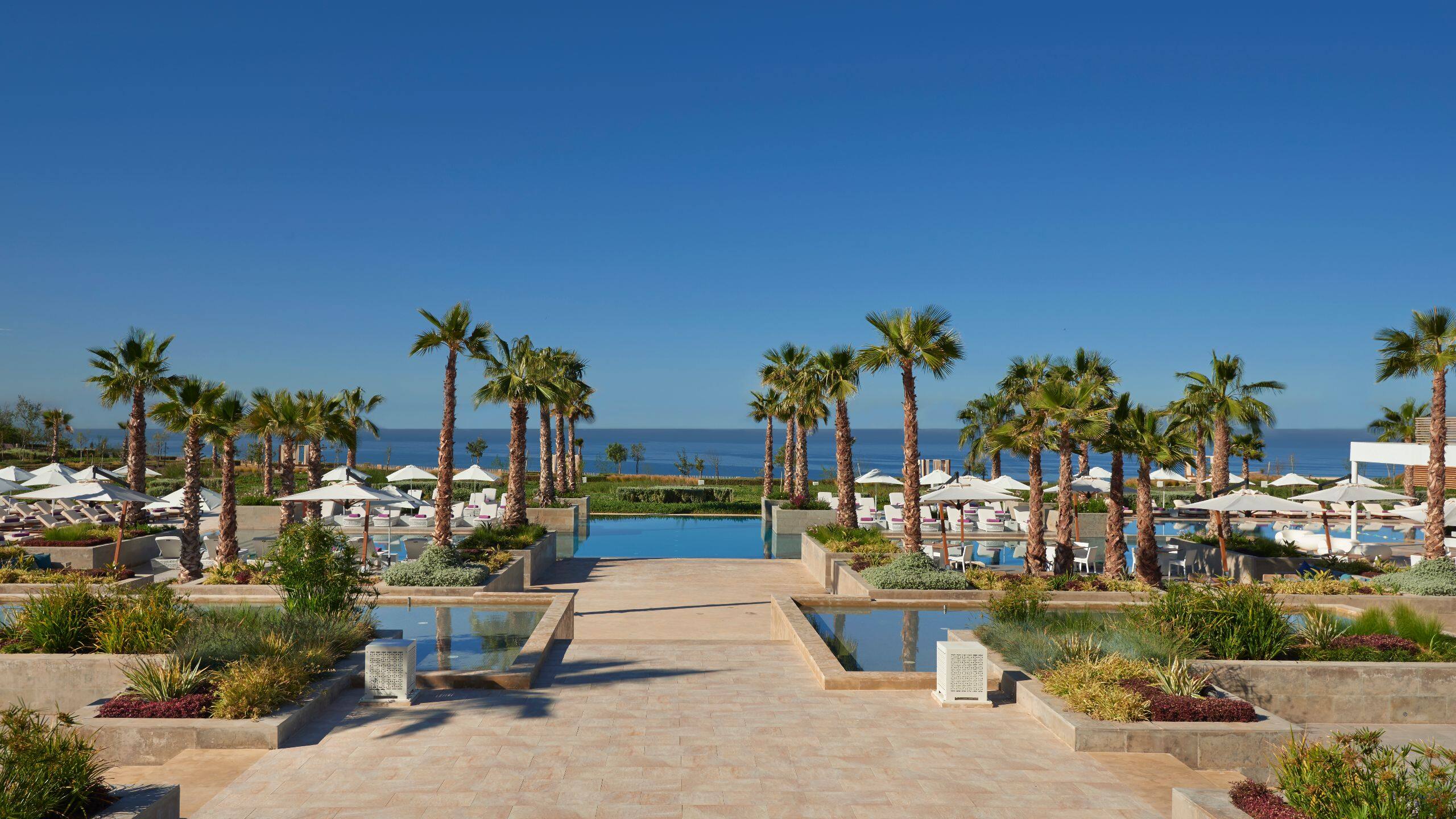 https://assets.hyatt.com/content/dam/hyatt/hyattdam/images/2016/05/26/0913/Hyatt-Place-Taghazout-Bay-P076-Outdoor-Swimming-Pool.jpg/Hyatt-Place-Taghazout-Bay-P076-Outdoor-Swimming-Pool.16x9.jpg?utm_source=chatgpt.com