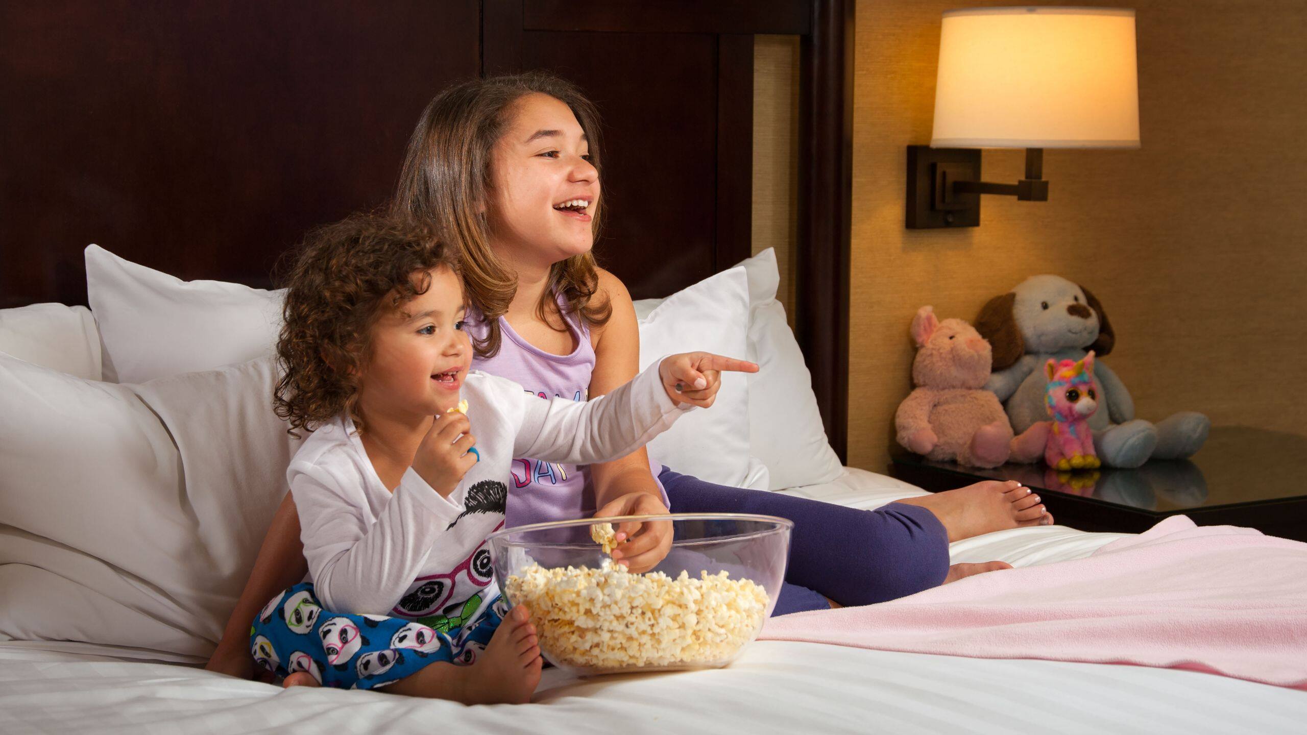 Hyatt Regency Bellevue on Seattle's Eastside Kids in Pajamas Watching Movie