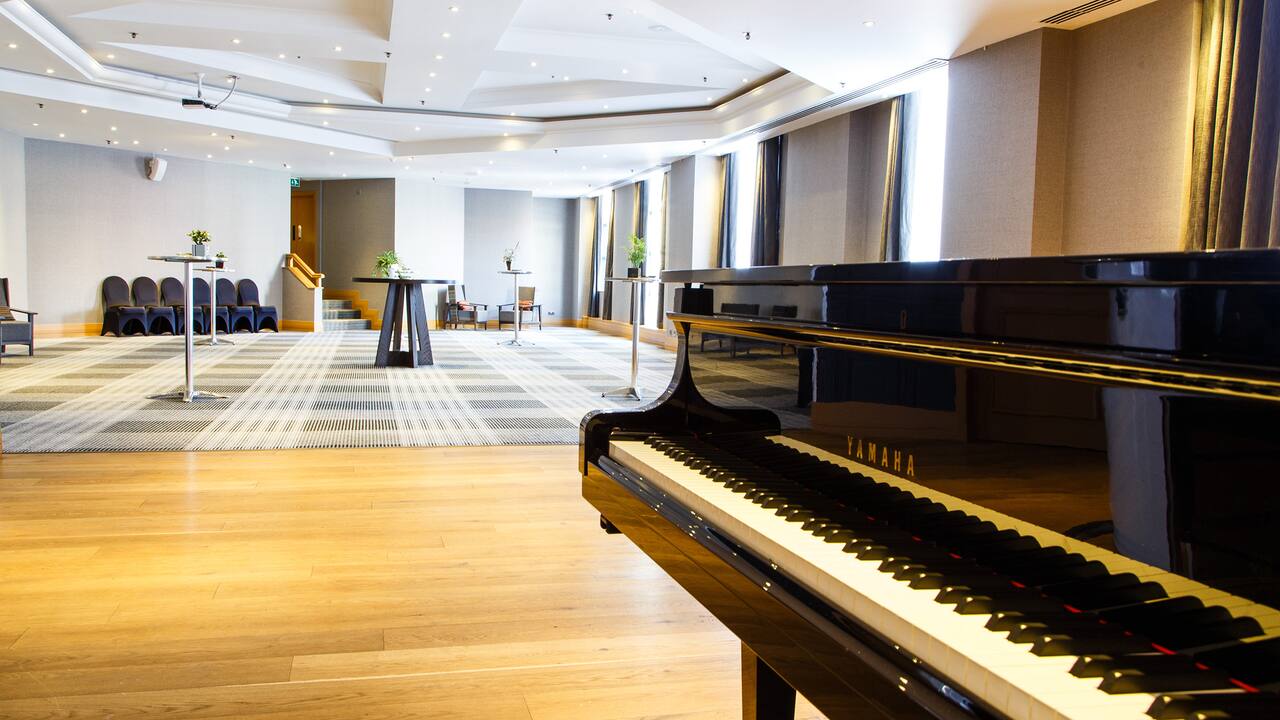 Sonata room reception set up with piano at Hyatt Regency Birmingham