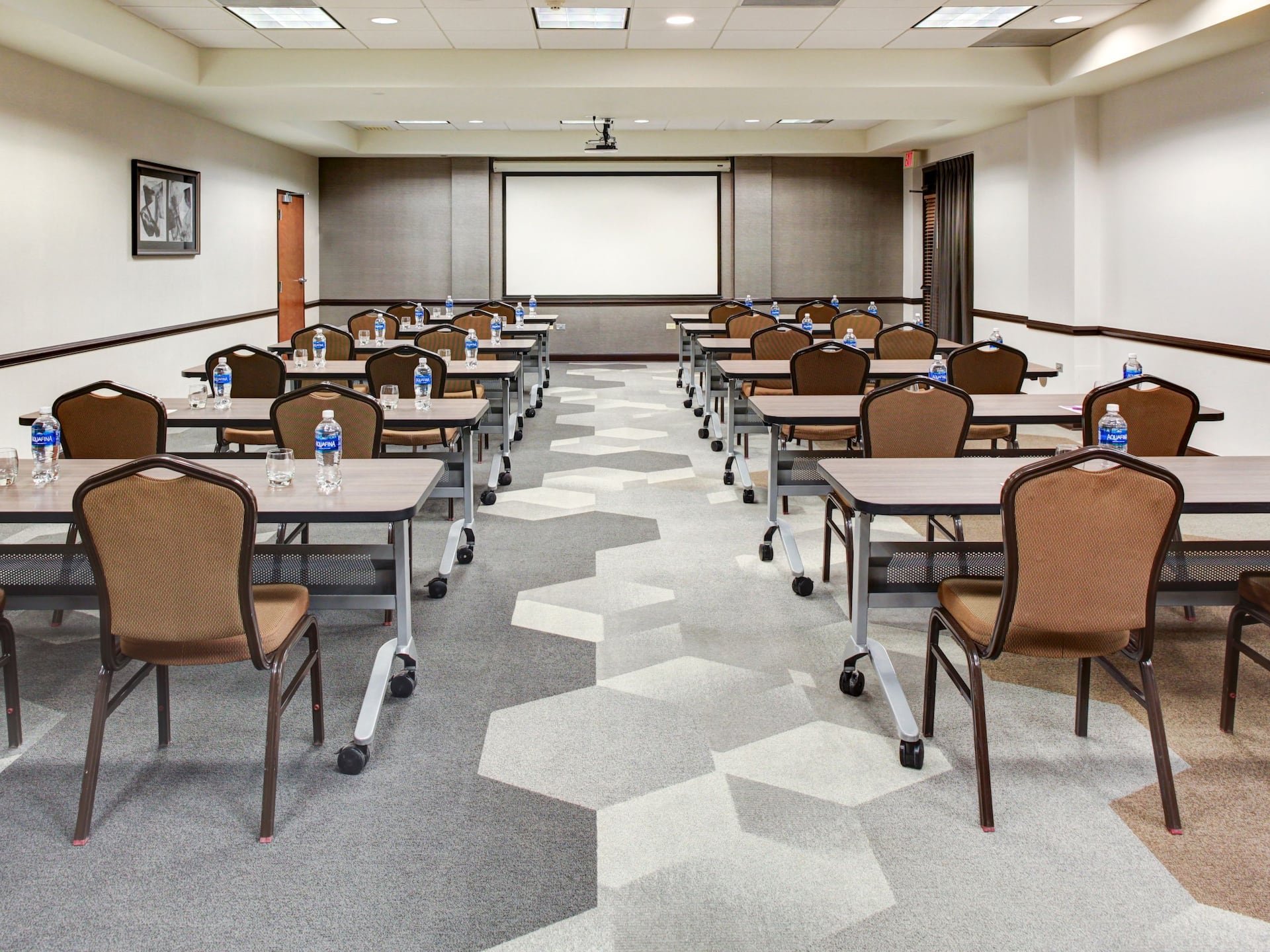 Meeting Room Classroom Table Setup with Projection Screen