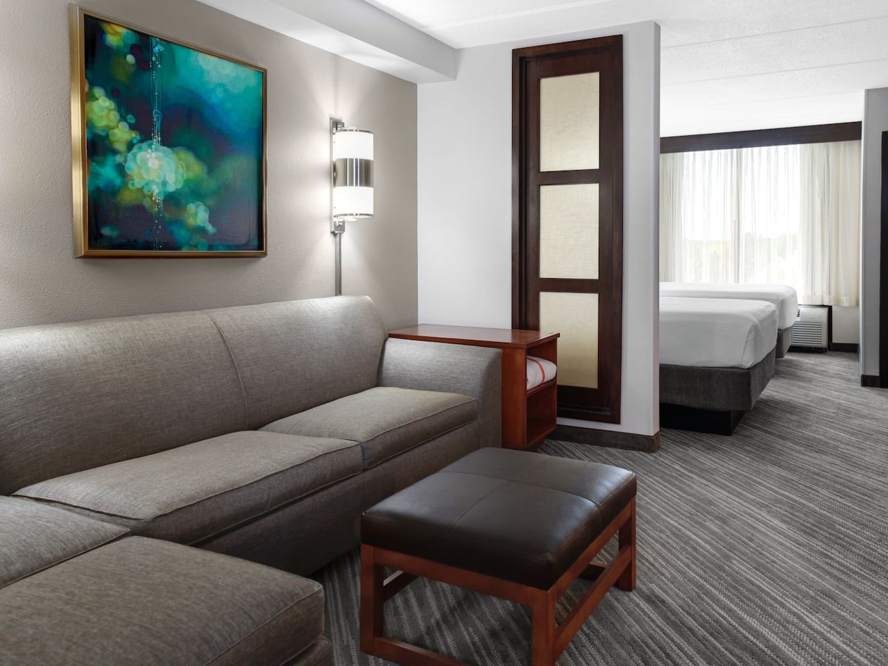 Cincinnati hotel room with double queen-sized beds and seating area at Hyatt Place Cincinnati Northeast