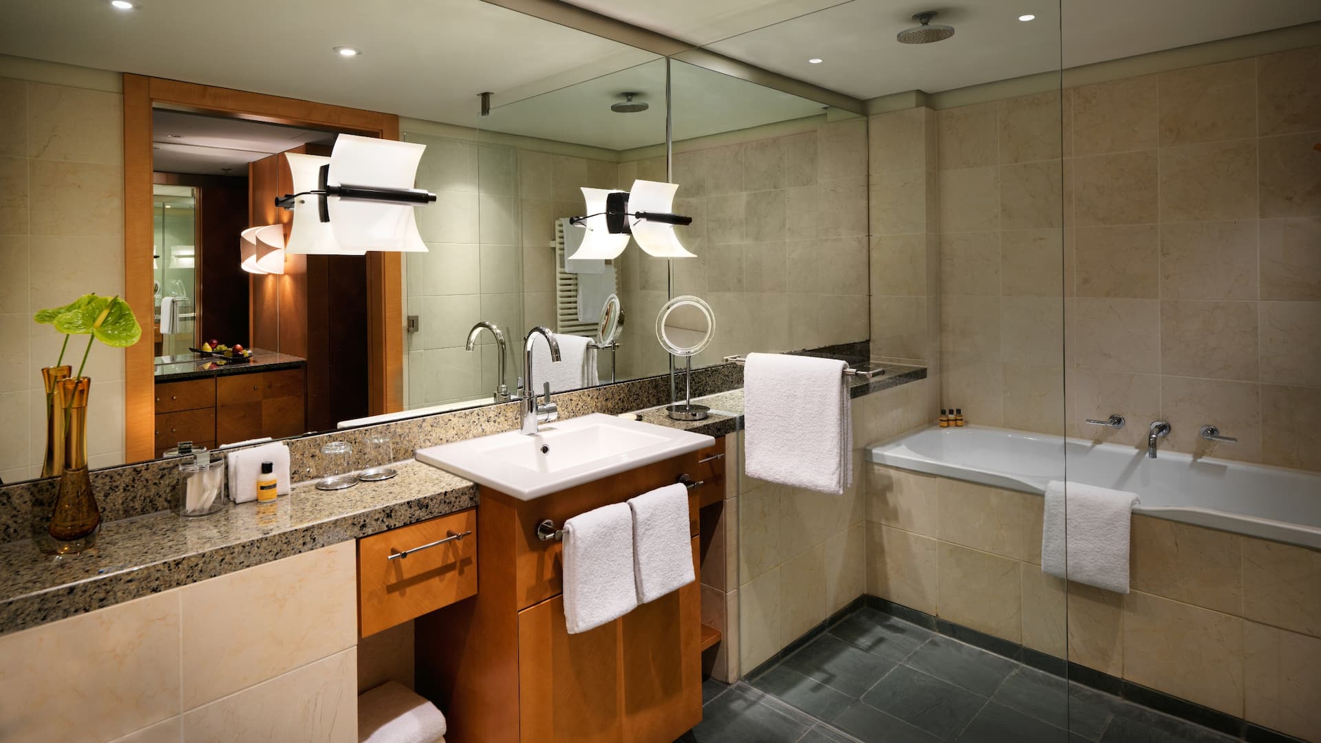 Spacious bathroom at Hyatt Regency Mainz with marble faucet and bathtub