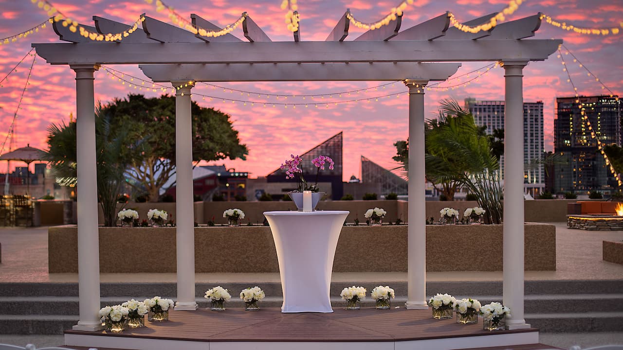 Terrace wedding ceremony at sunset 