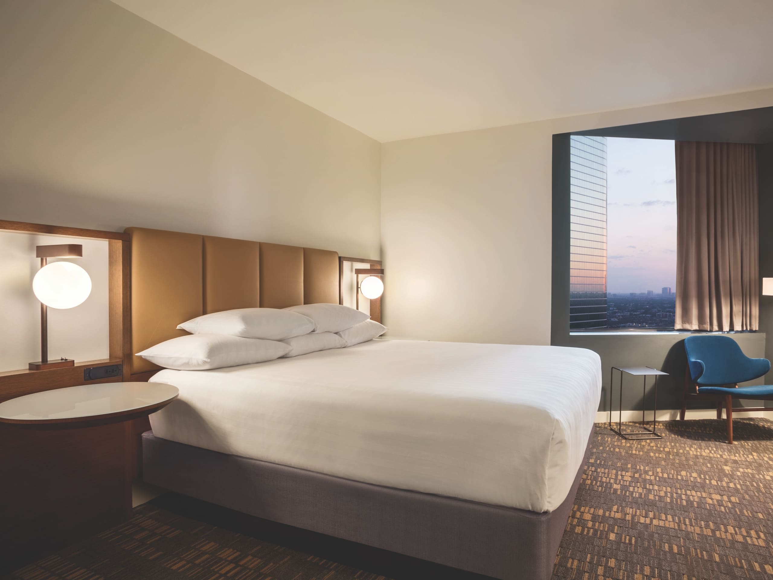 Hyatt Regency Houston imperial suite guest room with king sized bed