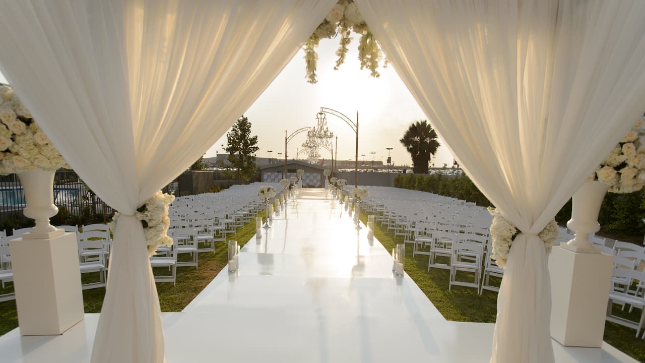 Covered lawn wedding ceremony at Hyatt Regency Los Angeles International Airport