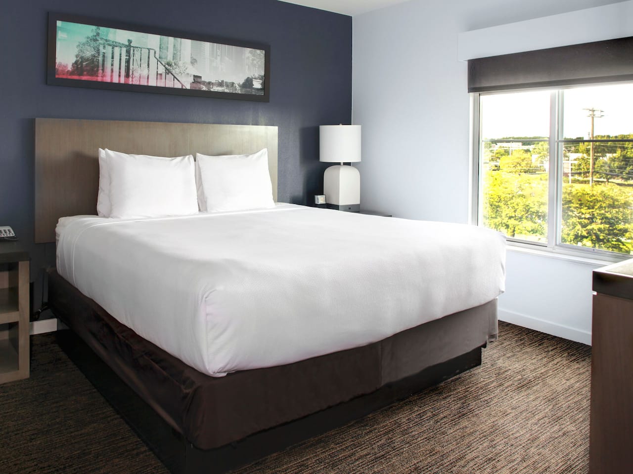 Guestroom king sized bed at Hyatt House Boston / Burlington