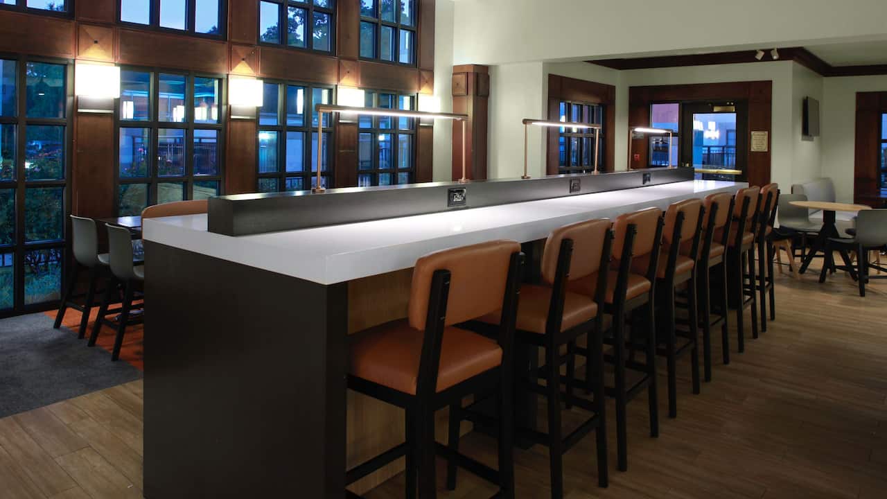Seating area with charging ports at Hyatt House Morristown