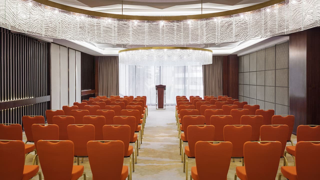 Rows of chairs in hotel ballroom