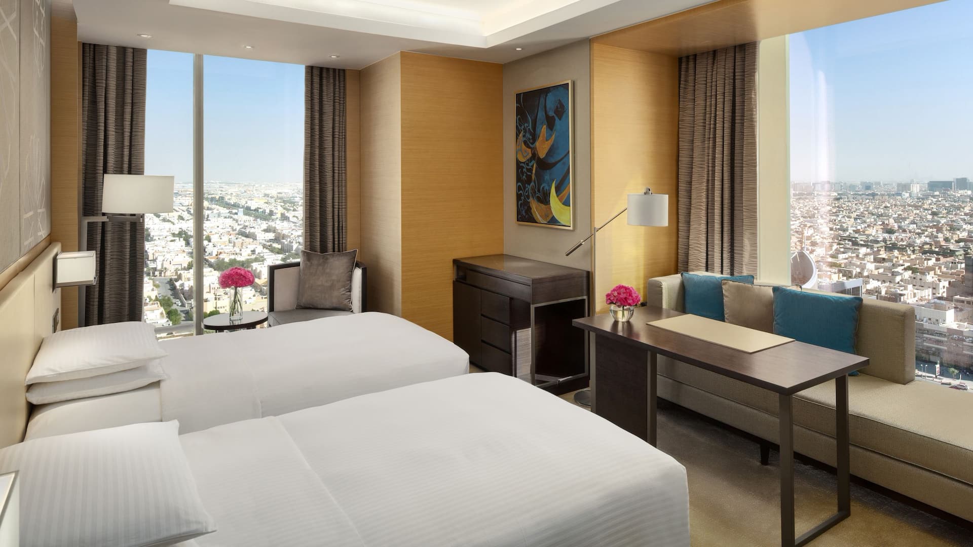Two twin-sized beds in hotel room