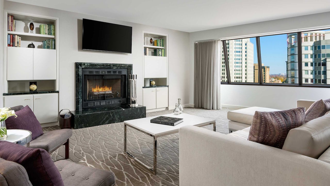 Presidential Suite living room with fireplace 