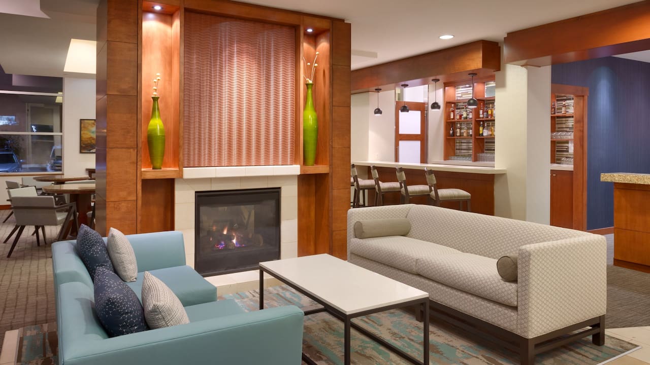 Lobby seating with fireplace and bar