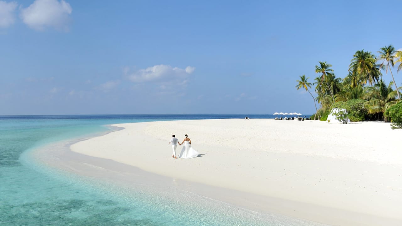 Couple Walking on Beach