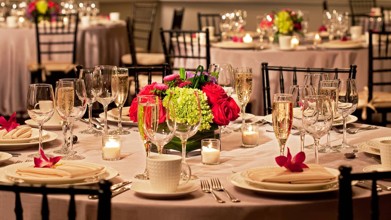 Elegantly designed table arrangements in Cape Cod Banquet room