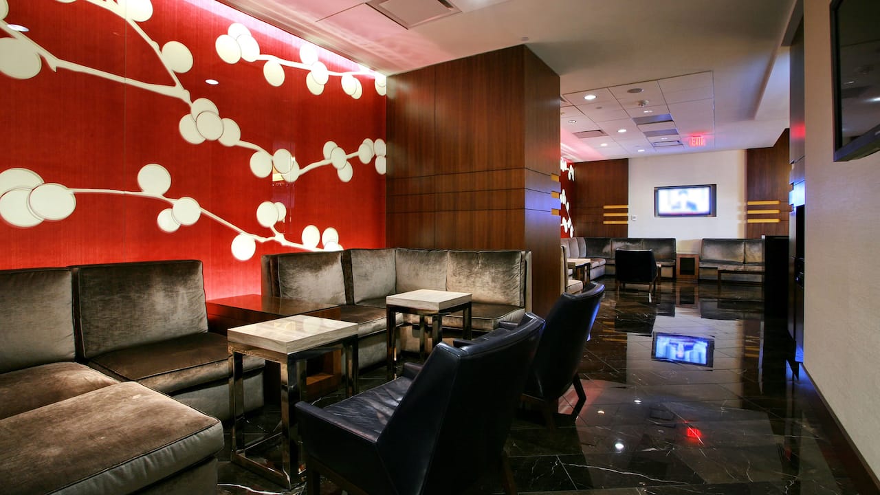 Cinnabar American cuisine restaurant with art wall and seating area
