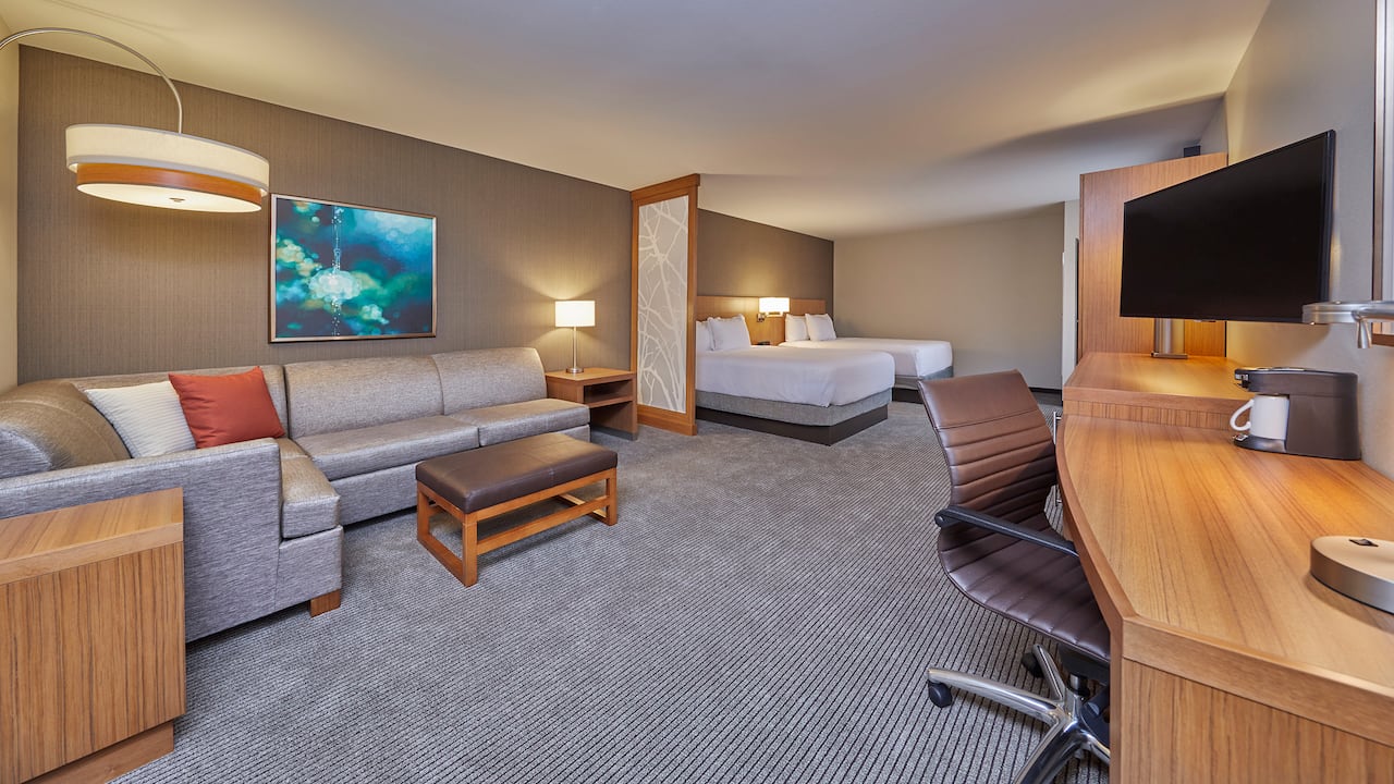 Room with two beds at our pet friendly hotel in Eugene, OR