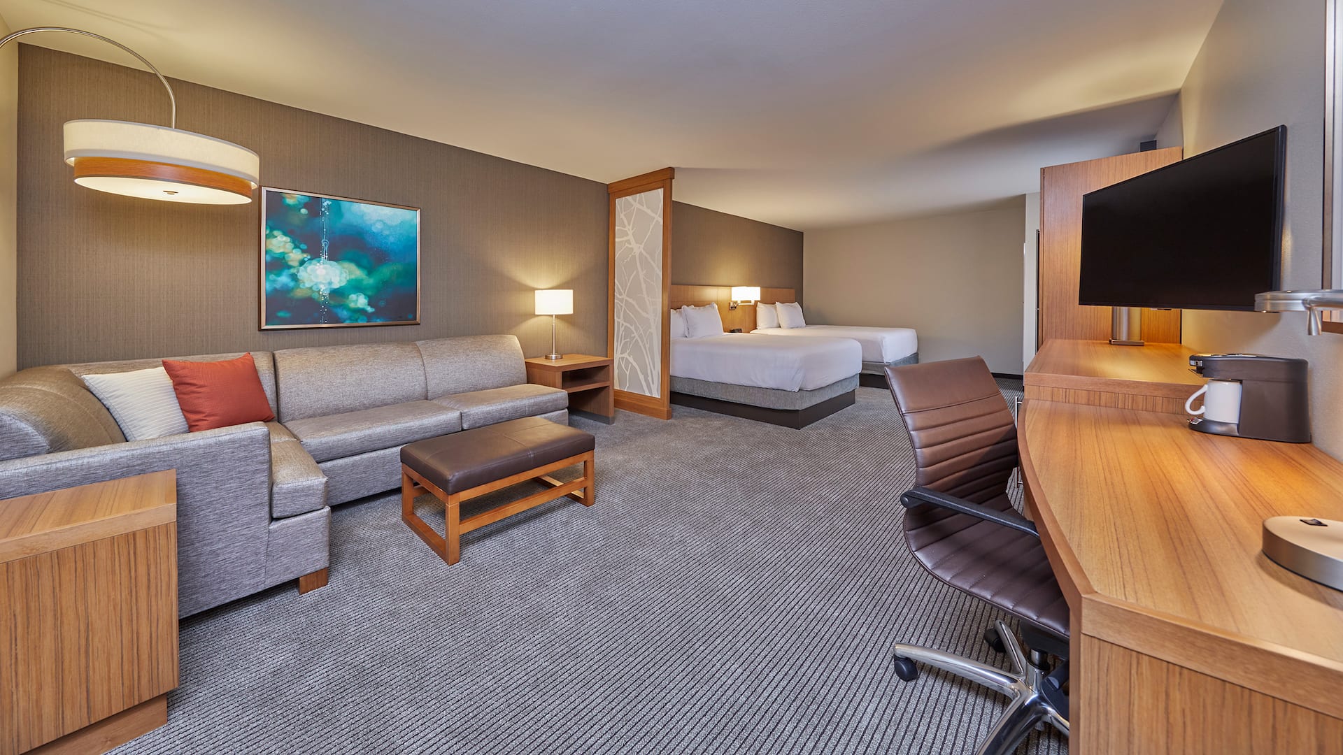 Room with two beds at our pet friendly hotel in Eugene, OR