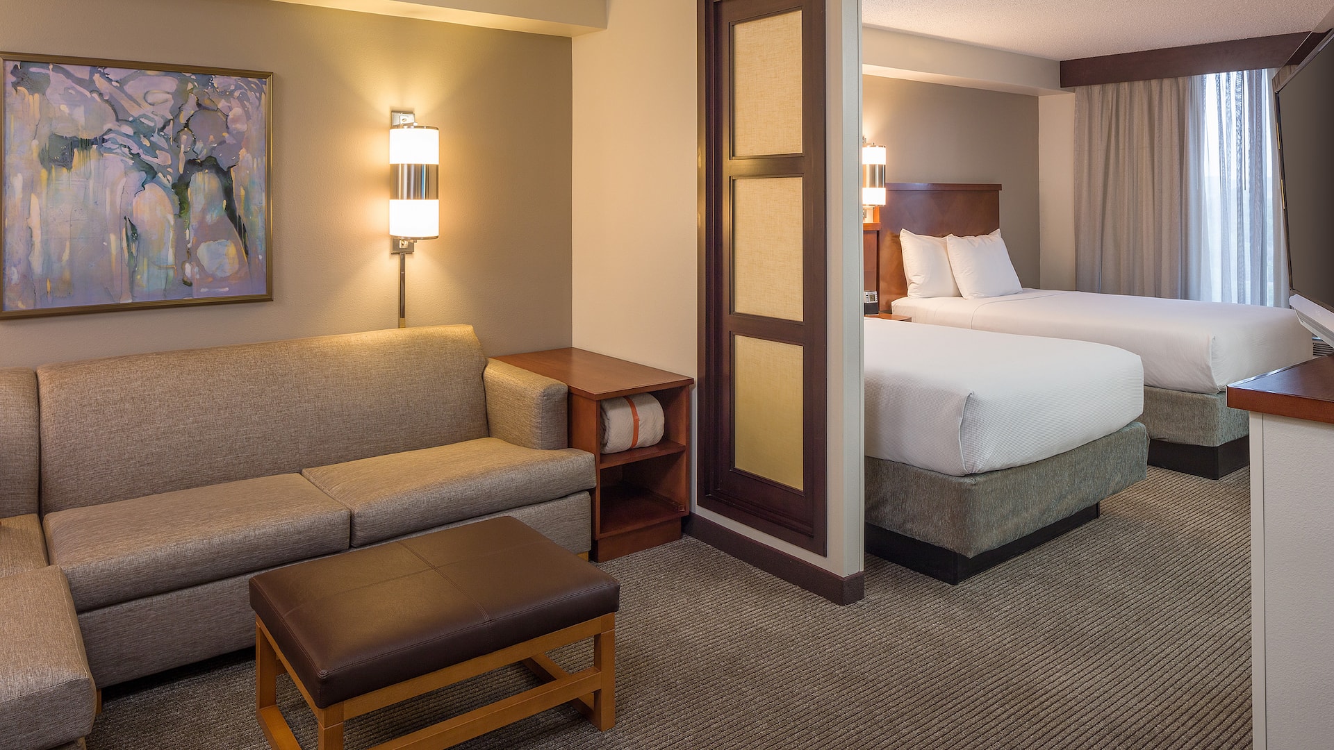 two beds with couch