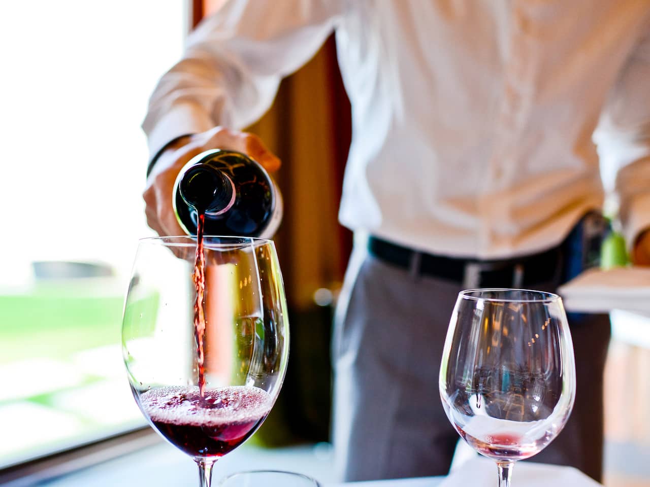 Waiter Pouring Wine
