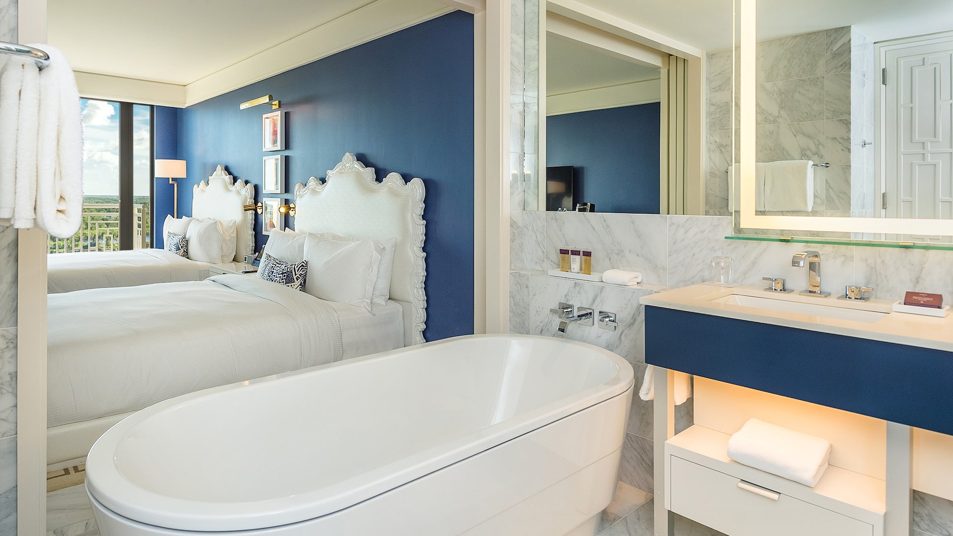 3/4 Two opulent queen hotel resort bedrooms with a juliet balcony in Nassau Bahamas