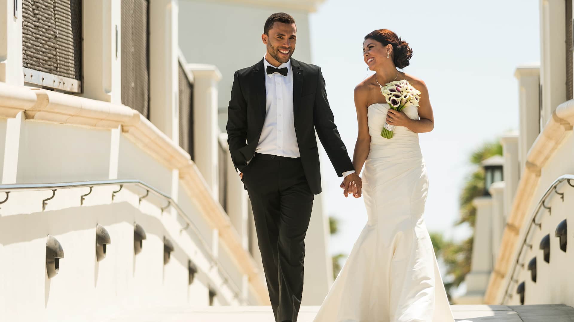 Hyatt Regency Huntington Beach Resort and Spa Wedding Couple Holding Hands