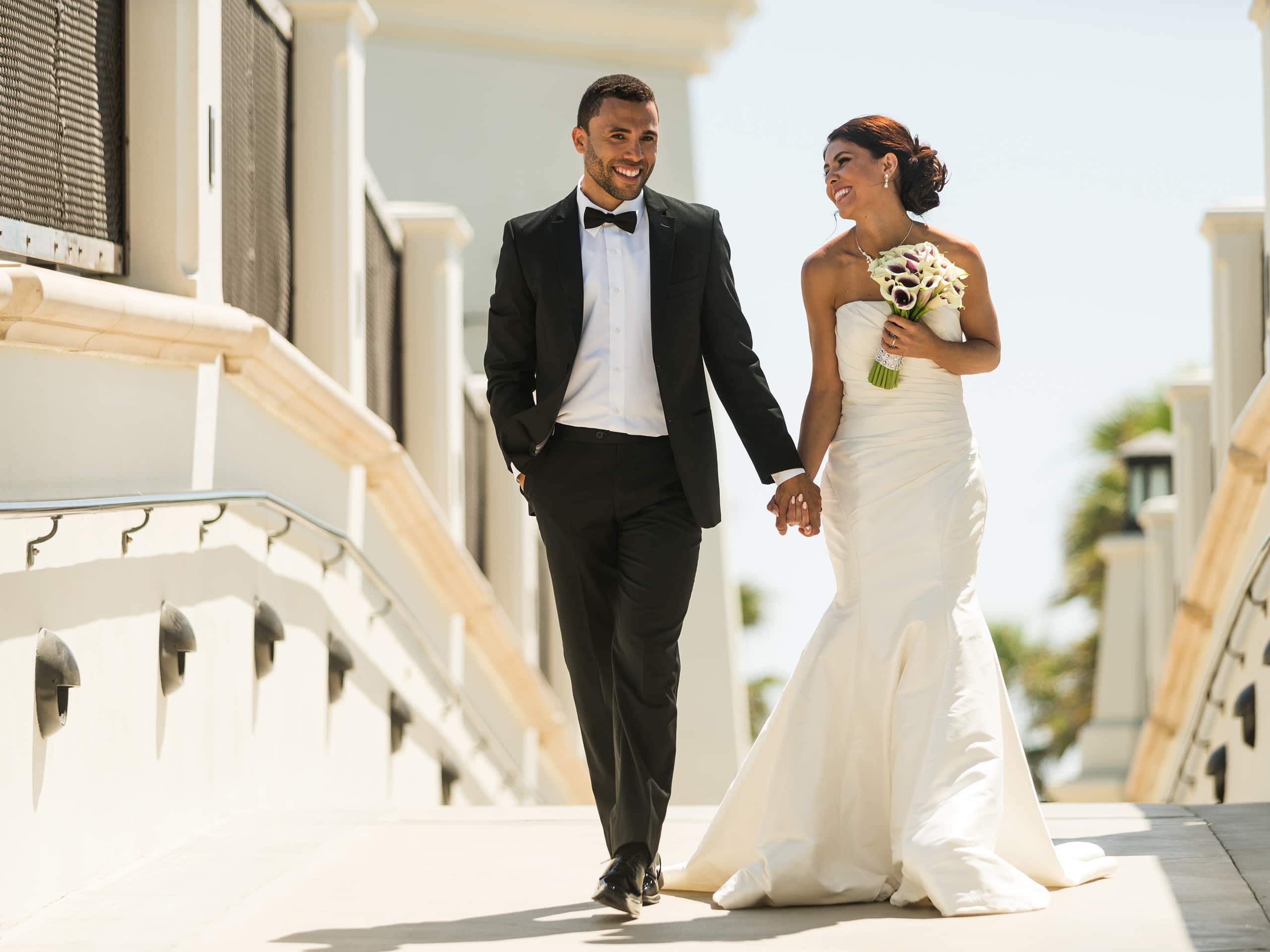 Hyatt Regency Huntington Beach Resort and Spa Wedding Couple Holding Hands