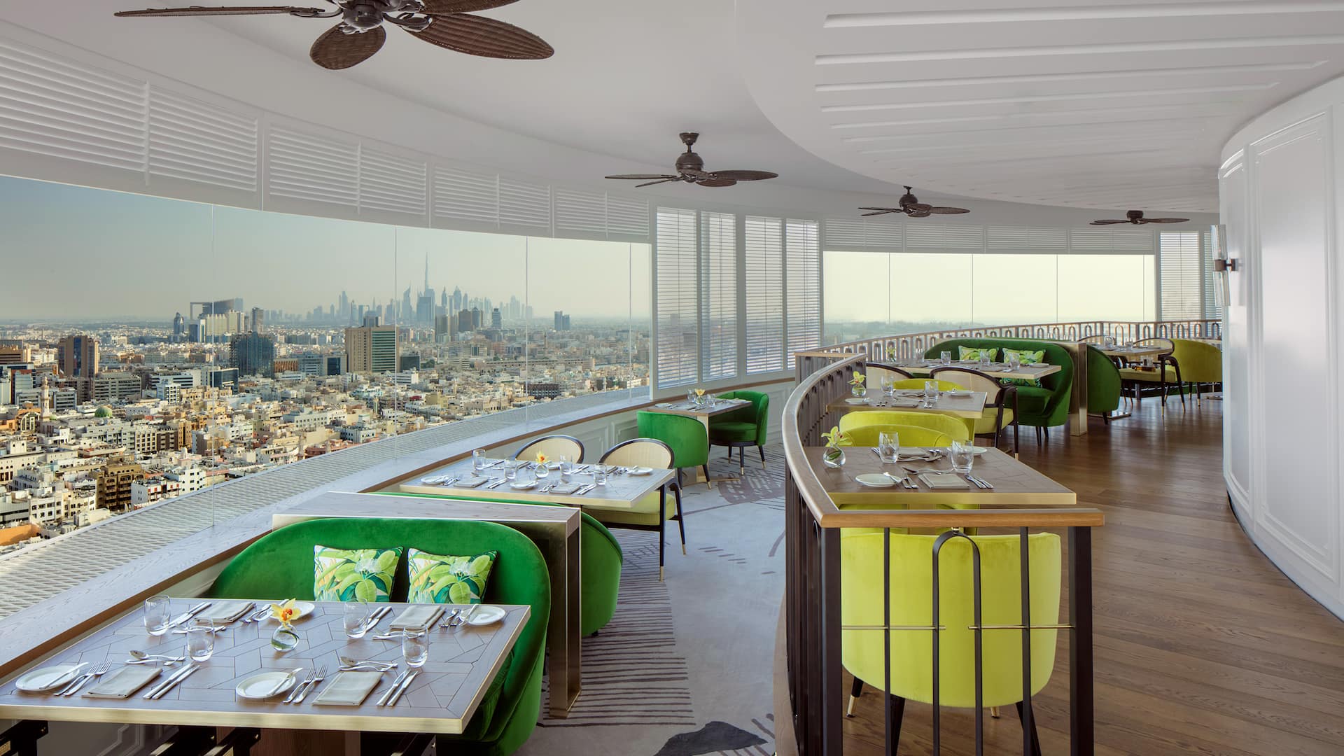 Dining tables and chairs in revolving hotel restaurant