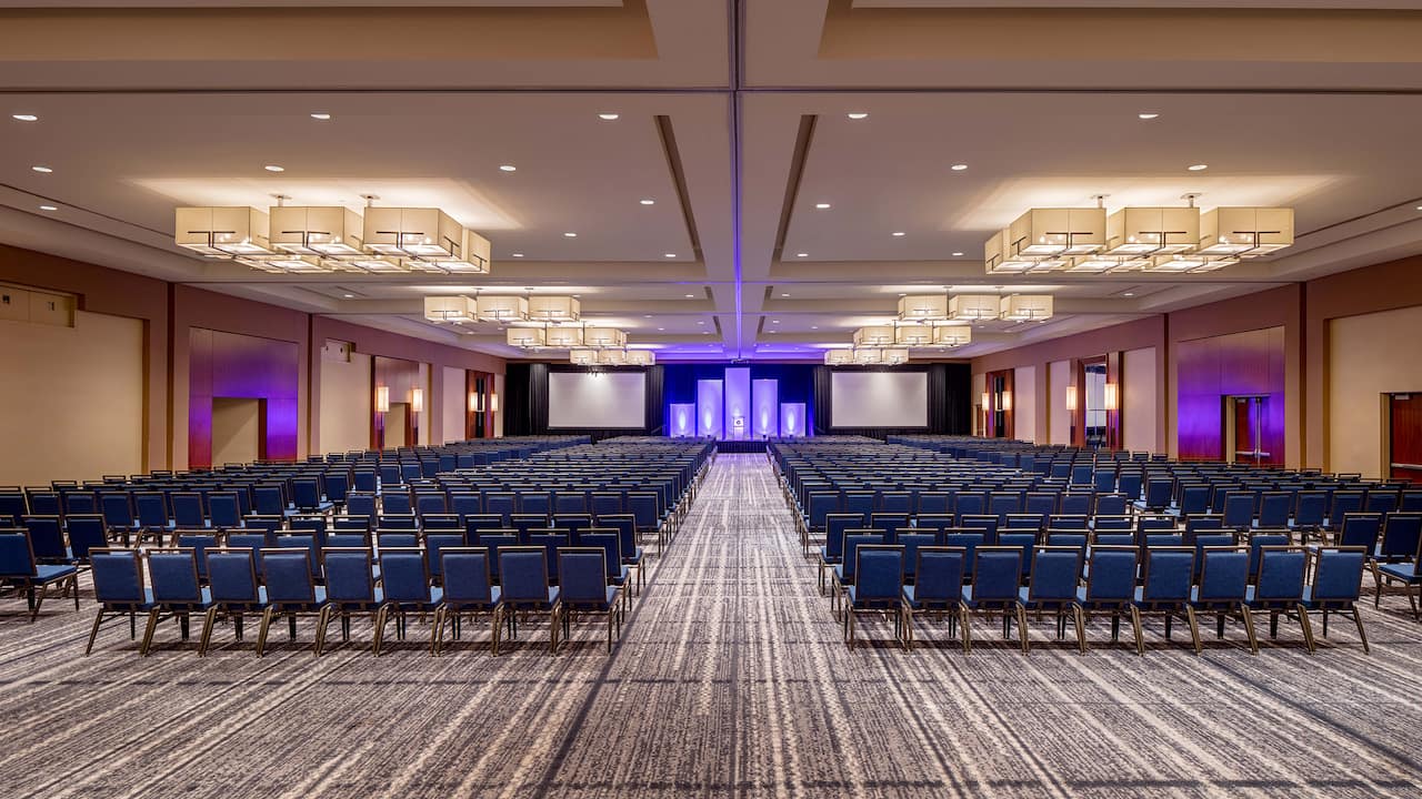 Rows of chairs in large hotel ballroom